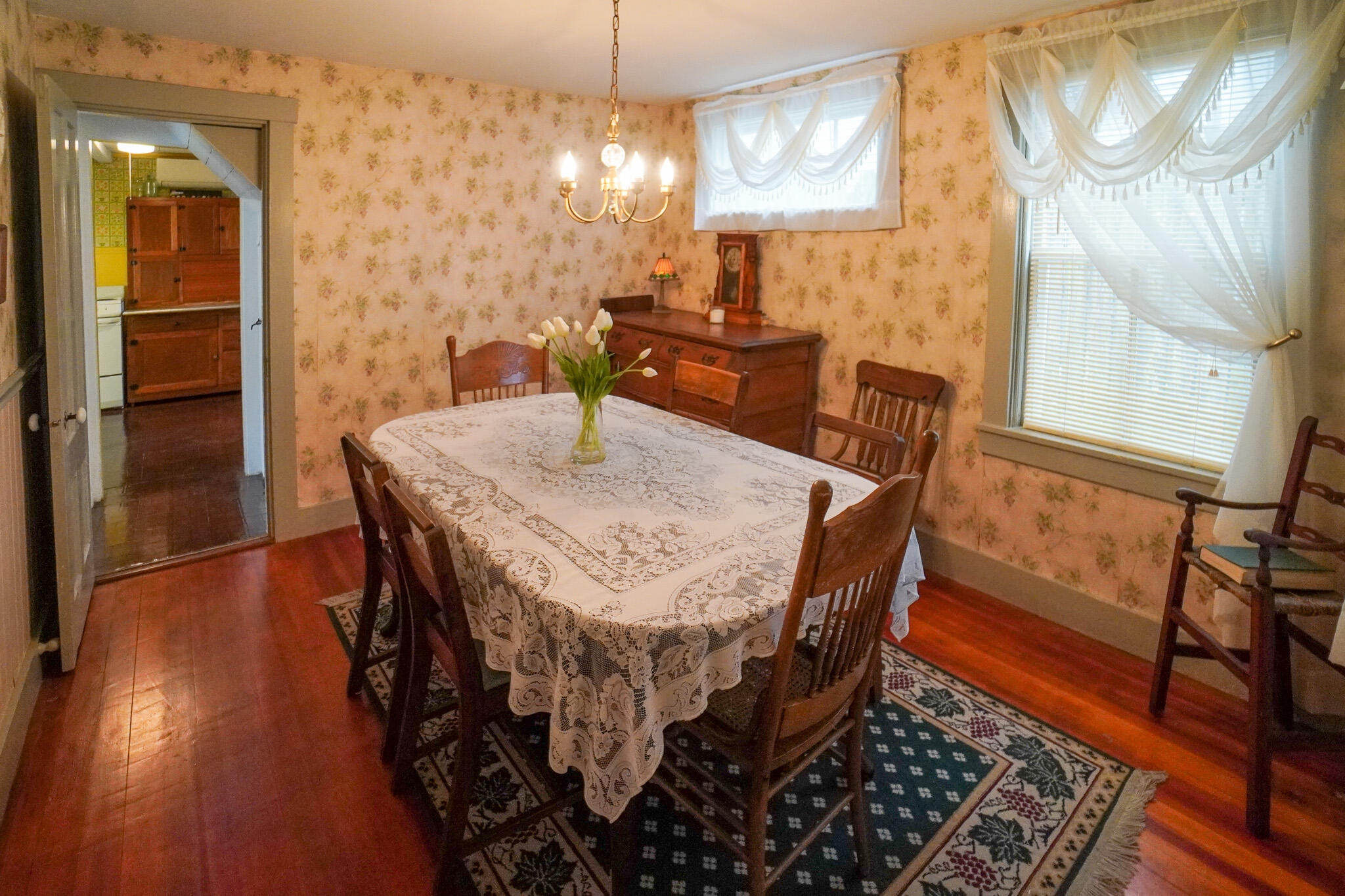 5 Tabernacle Avenue Oak Bluffs, MA 02557 - Photo 13 of 37 a view of a dining room with furniture and wooden floor