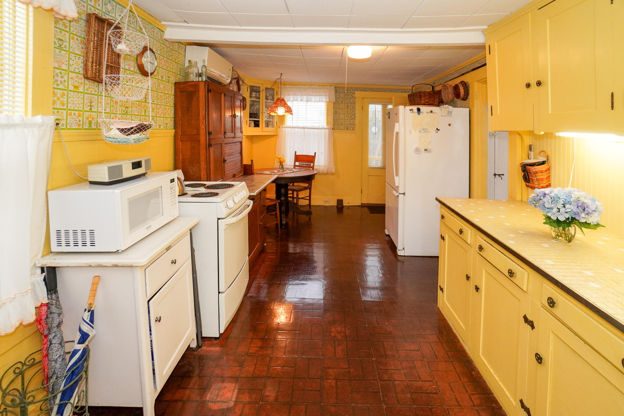 5 Tabernacle Avenue Oak Bluffs, MA 02557 - Photo 16 of 37 a kitchen with stainless steel appliances a stove a sink and a refrigerator