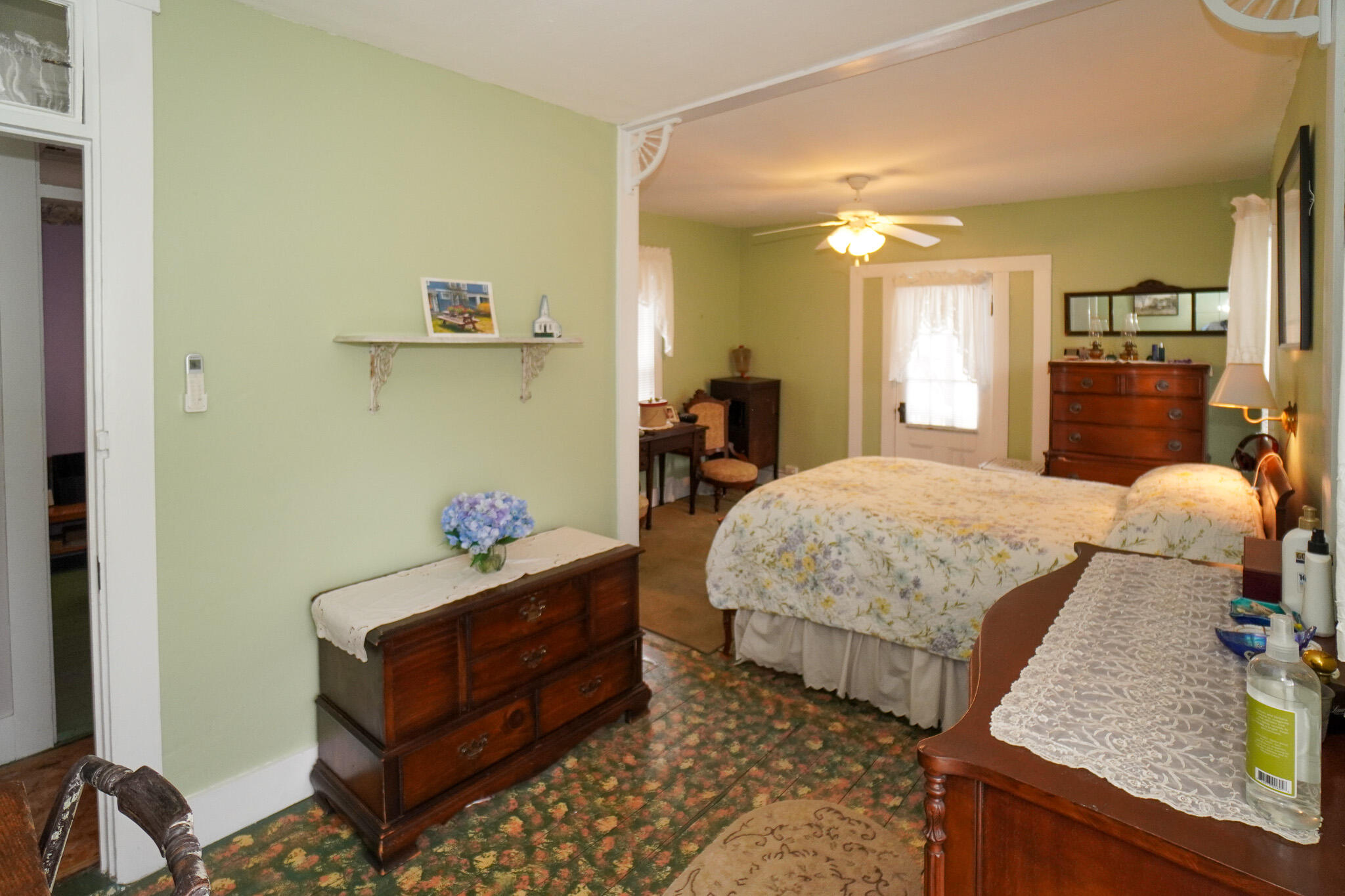 5 Tabernacle Avenue Oak Bluffs, MA 02557 - Photo 19 of 37 a bedroom with a bed and wooden floor