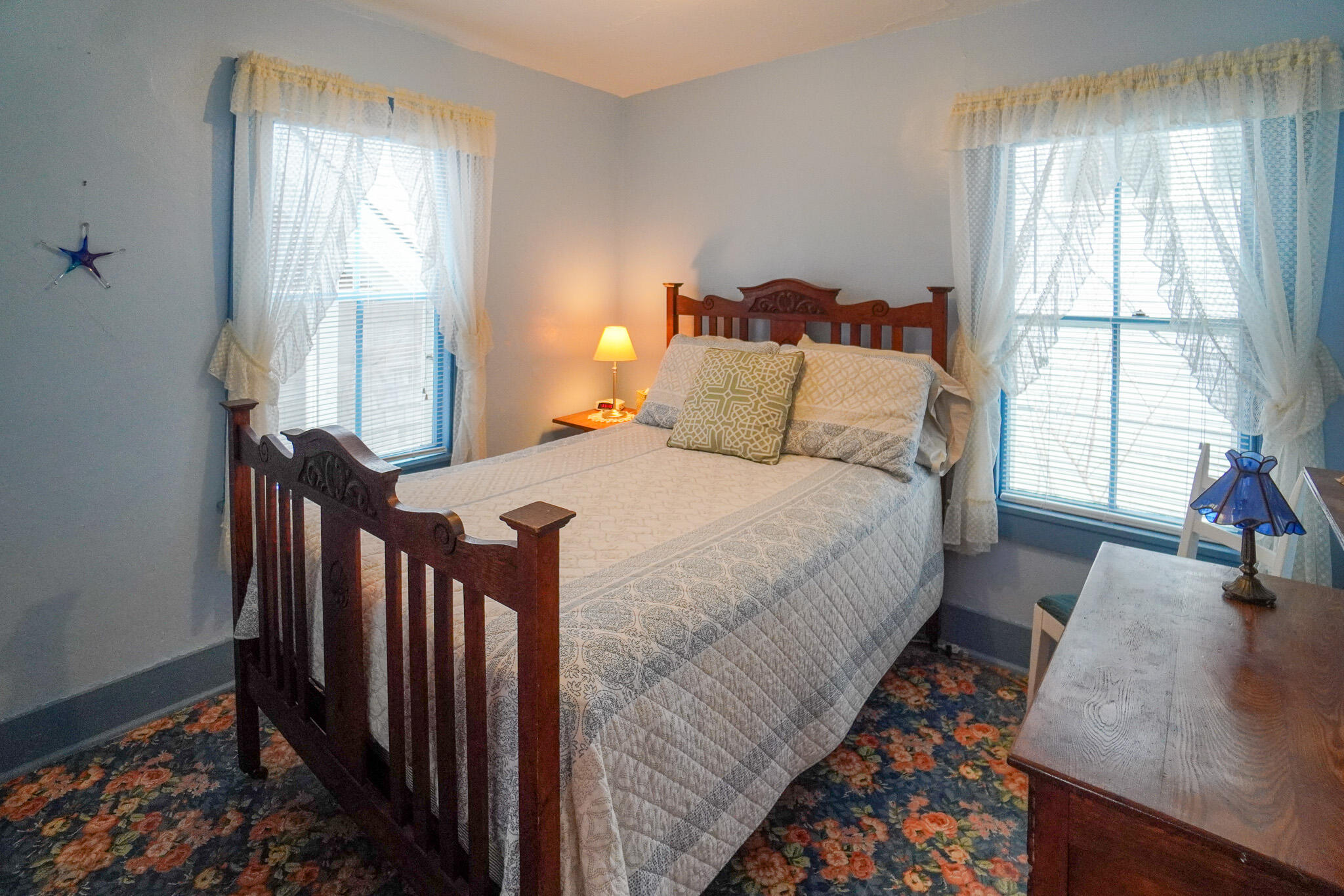 5 Tabernacle Avenue Oak Bluffs, MA 02557 - Photo 22 of 37 a bed sitting in a bedroom next to a window