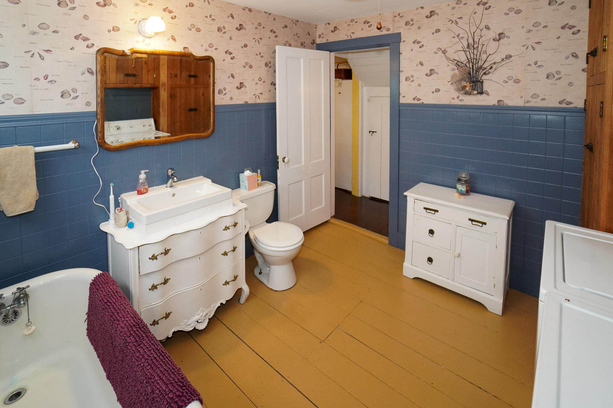 5 Tabernacle Avenue Oak Bluffs, MA 02557 - Photo 31 of 37 a bathroom with a toilet sink and mirror
