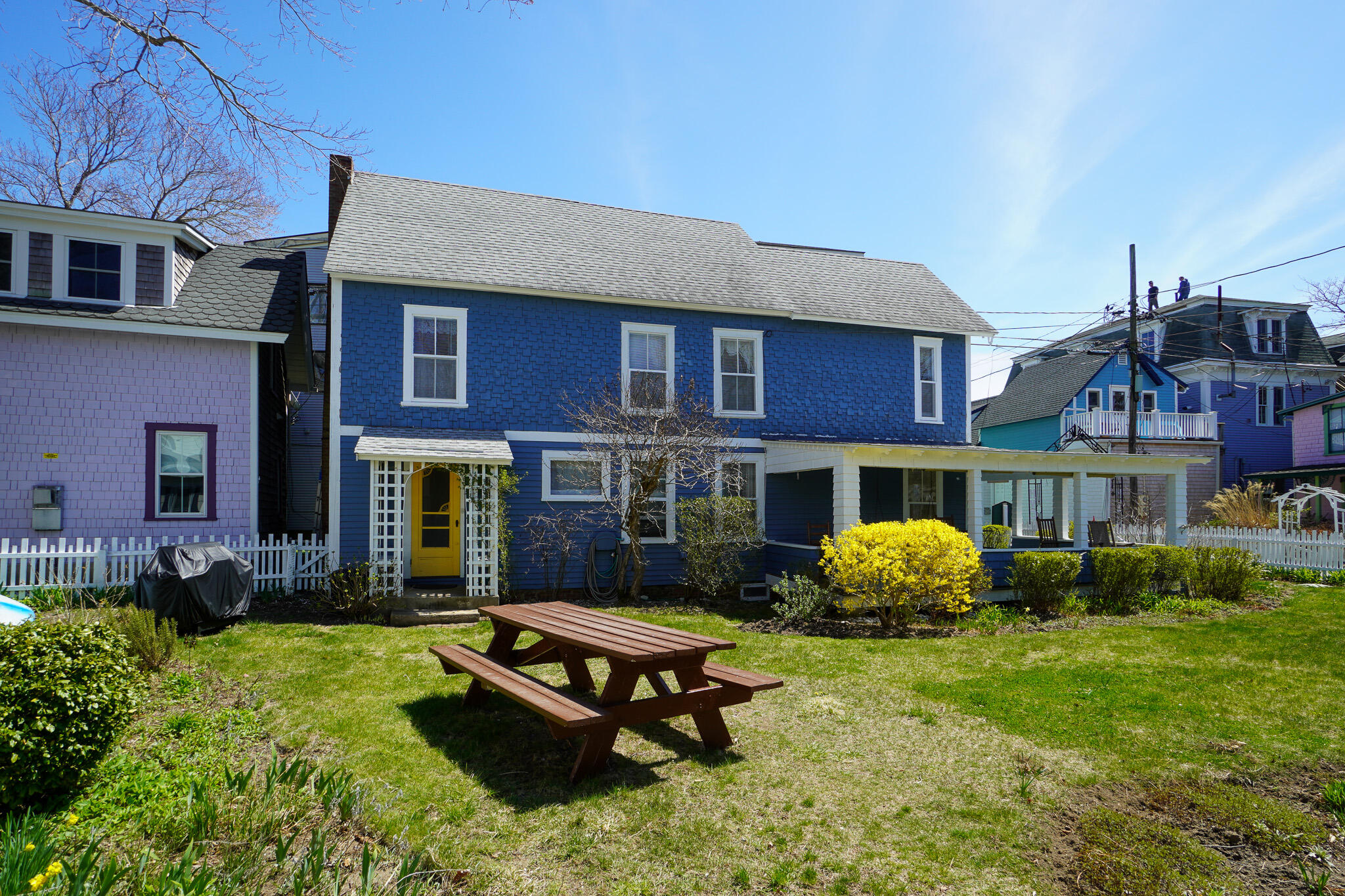 5 Tabernacle Avenue Oak Bluffs, MA 02557 - Photo 4 of 37 a backyard of a house with barbeque oven and outdoor seating