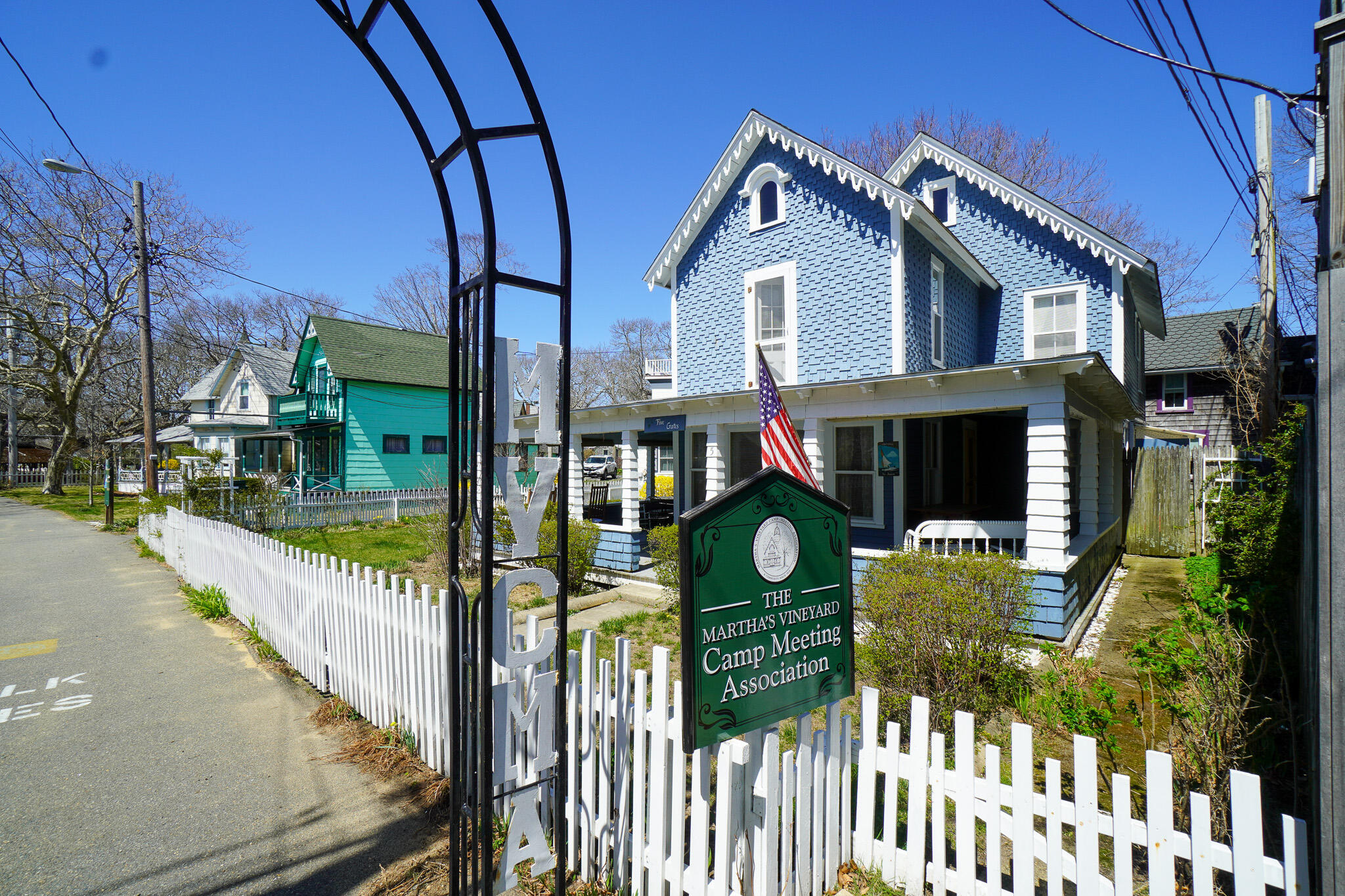 5 Tabernacle Avenue Oak Bluffs, MA 02557 - Photo 6 of 37 a front view of a house with a yard