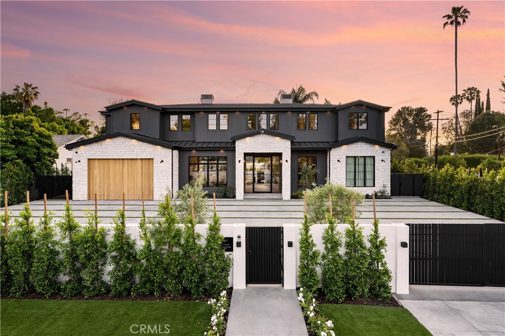 5471 Bothwell Road Tarzana, CA 91356 - Photo 1 of 1 a front view of a house with a garden