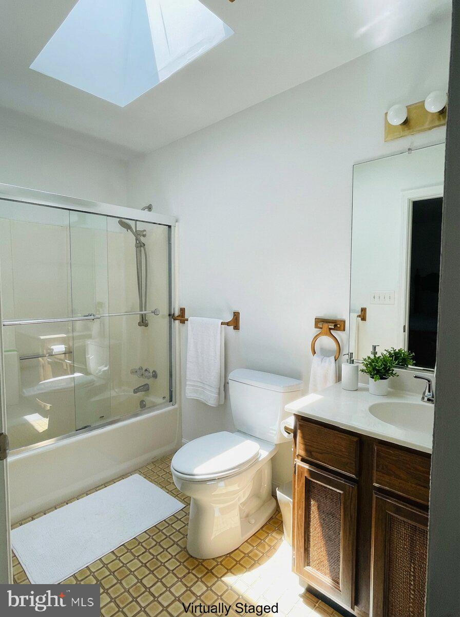 200 Pine Valley Road Locust Grove, VA 22508 - Photo 13 of 15 a bathroom with a sink toilet a mirror and shower