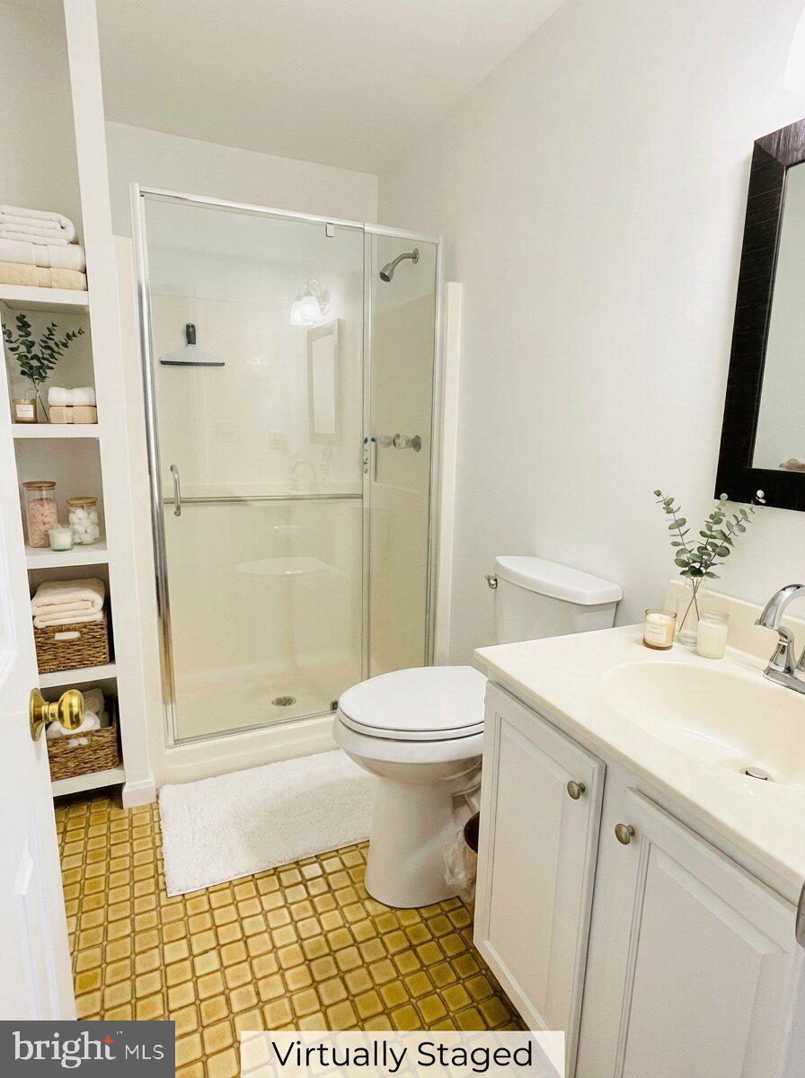 200 Pine Valley Road Locust Grove, VA 22508 - Photo 14 of 15 a bathroom with a sink toilet and shower