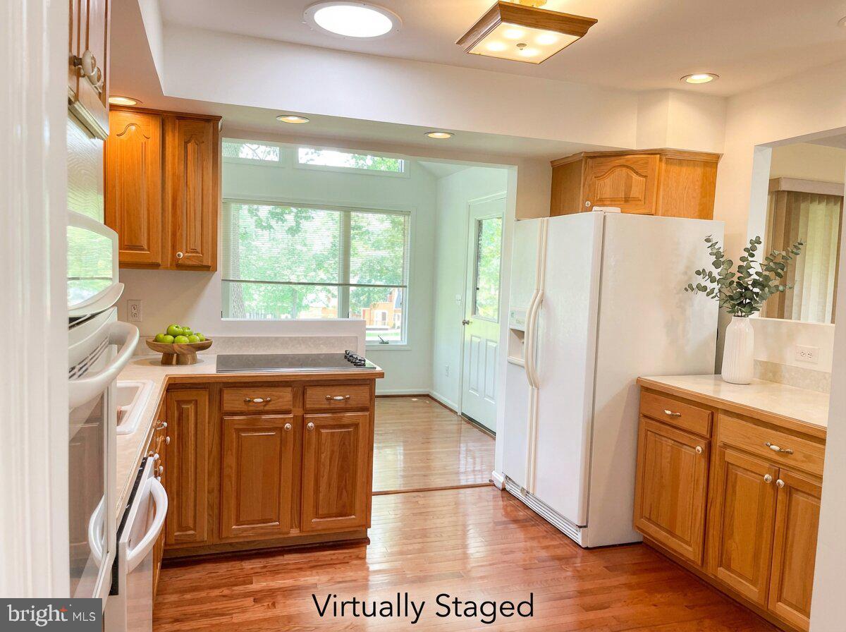 200 Pine Valley Road Locust Grove, VA 22508 - Photo 8 of 15 a kitchen with stainless steel appliances granite countertop a refrigerator and a stove