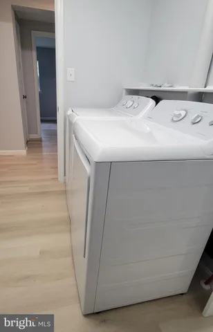 a utility room with washer and dryer