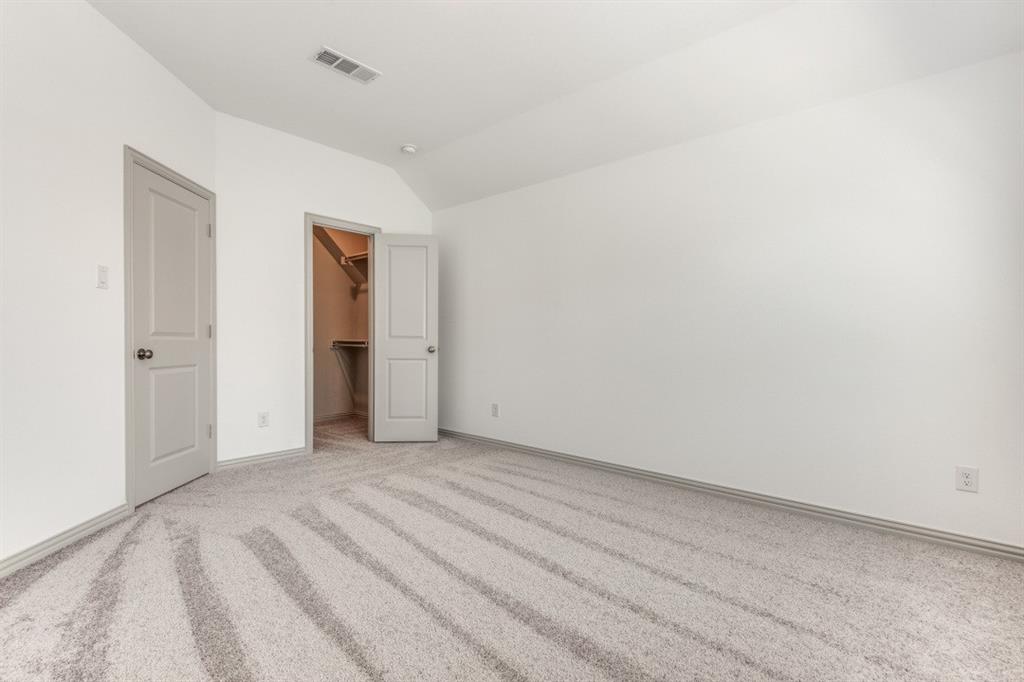 8913 Swallowtail Street Frisco, TX 75035 - Photo 14 of 38 a view of an empty room