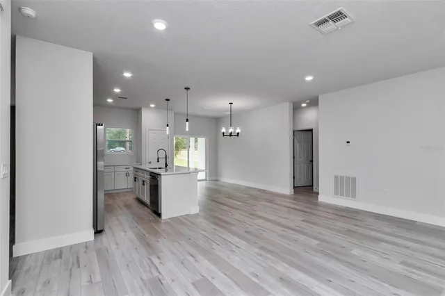 a view of a kitchen and a sink