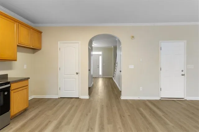 a view of a livingroom with wooden floor