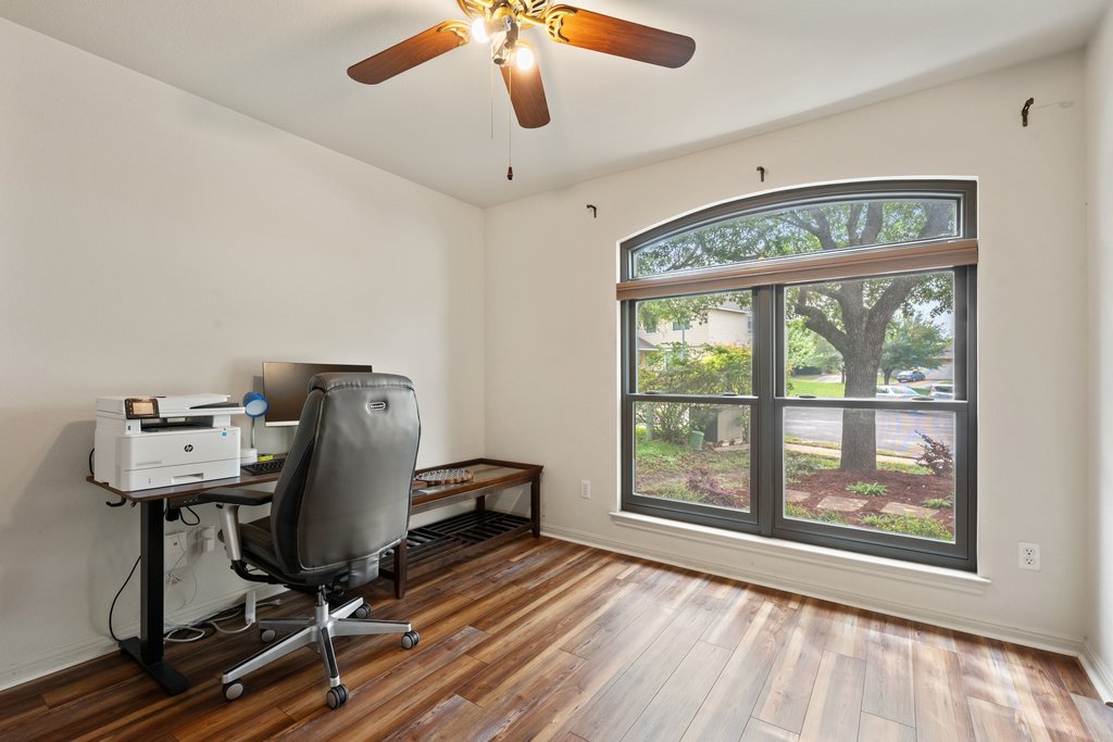 11508 Gossamer Drive Austin, TX 78754 - Photo 31 of 40 Bedroom with Arch-top window with integrated blinds.