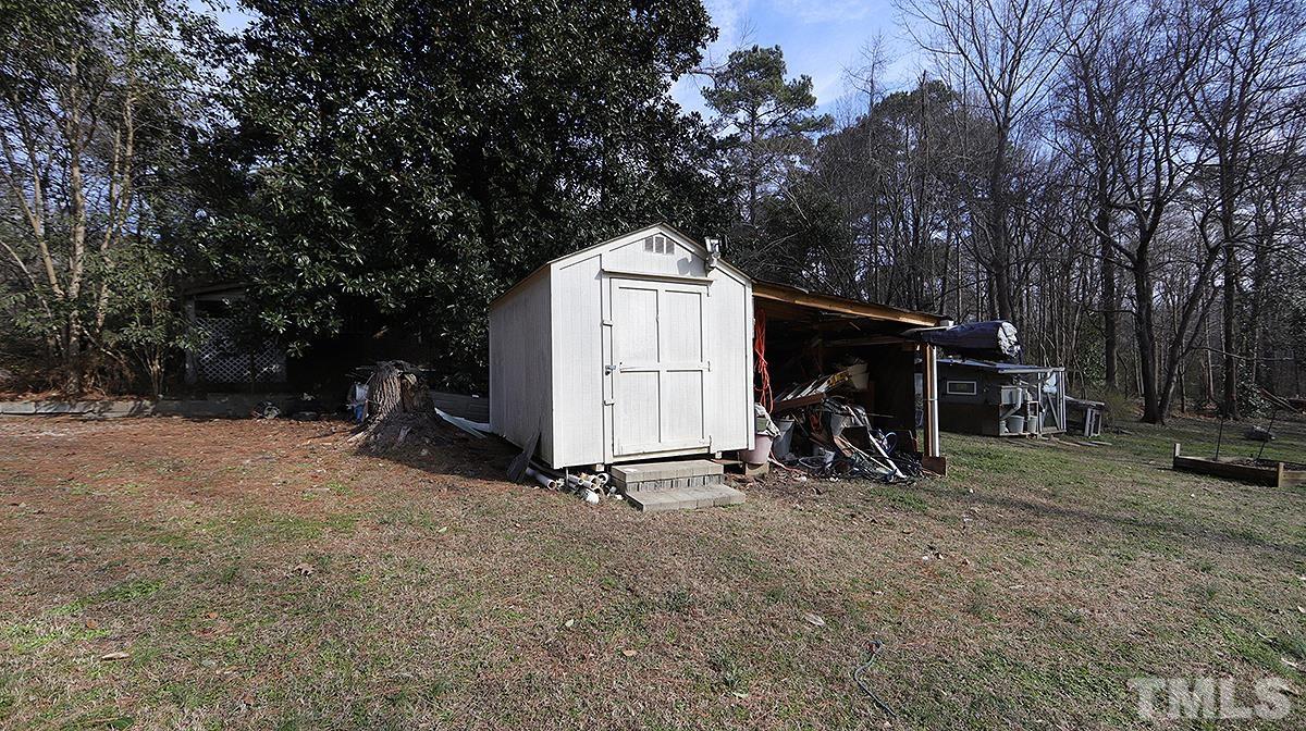 10633 Old Stage Road Raleigh, NC 27603 - Photo 19 of 20 a view of back yard of the house