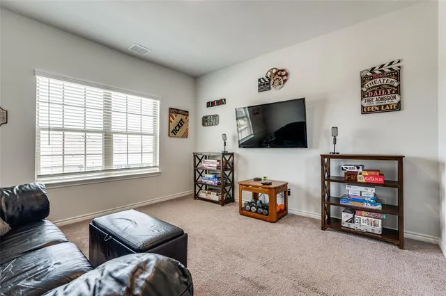 a spacious bathroom with a double vanity sink a mirror and a bathtub