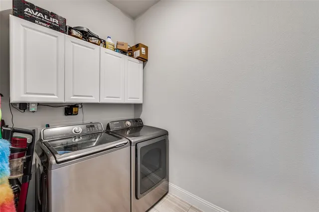 a view of bathroom with a toilet and a shower curtain