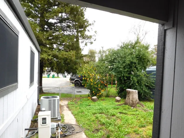 a view of yard from a balcony