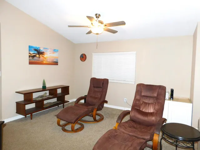 a work room with furniture and a chair