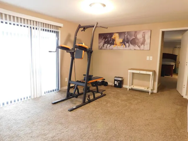 a view of a room with gym equipment