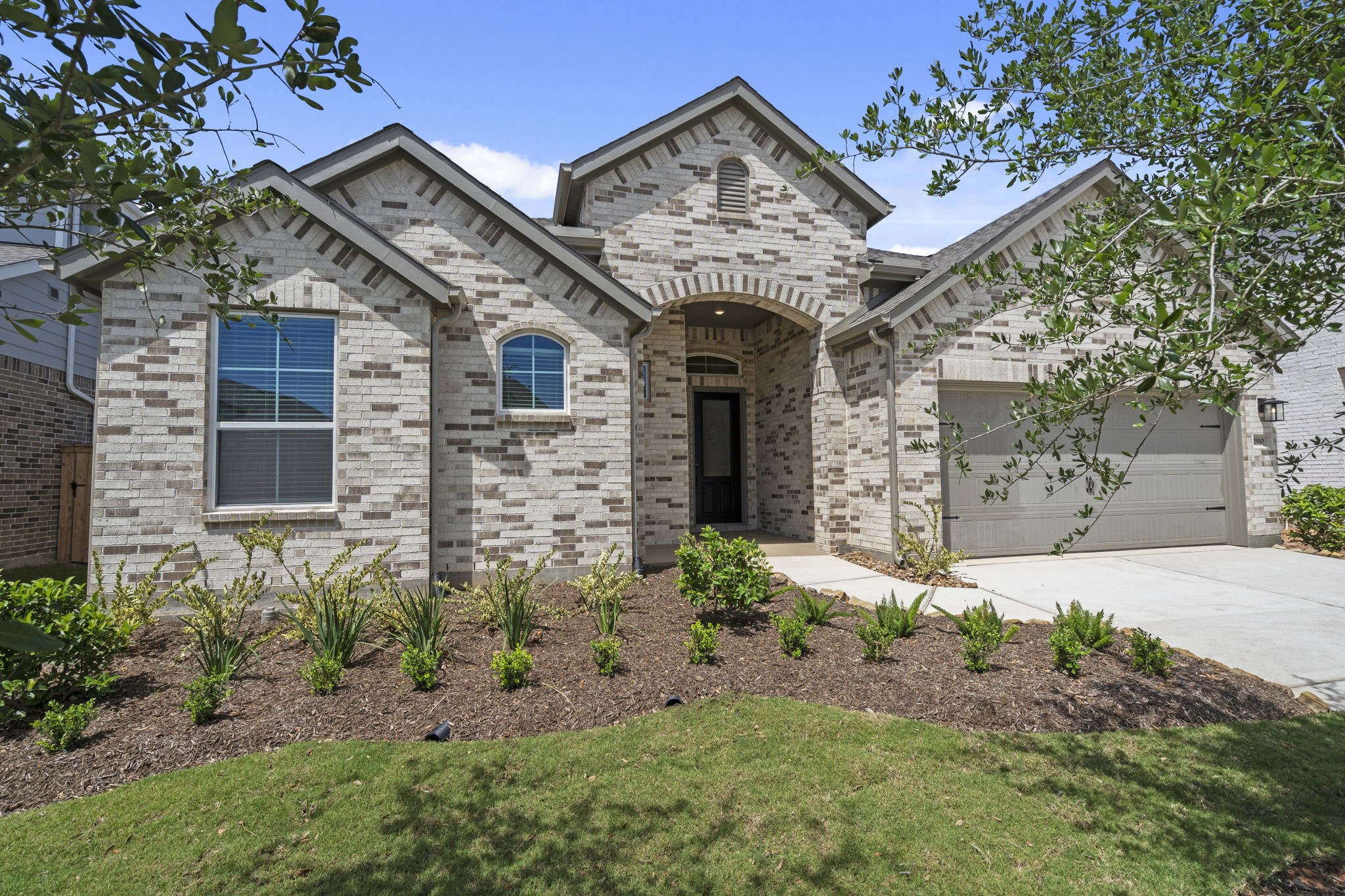 2910 Peach Vly Road Fulshear, TX 77423 - Photo 2 of 35 a front view of a house with garden