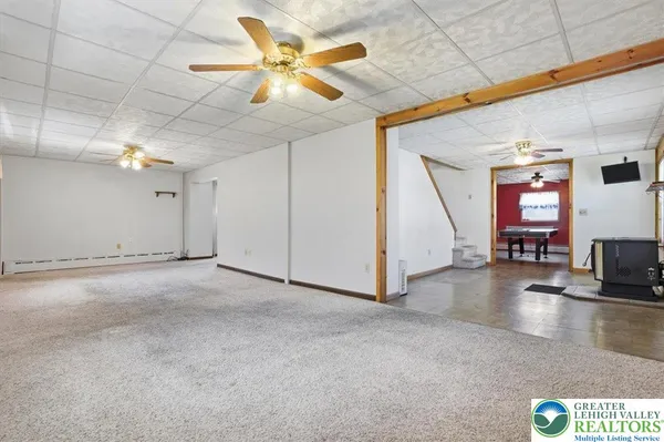 a view of an entryway with a carpet