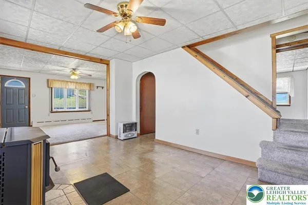 a kitchen with sink cabinets and window