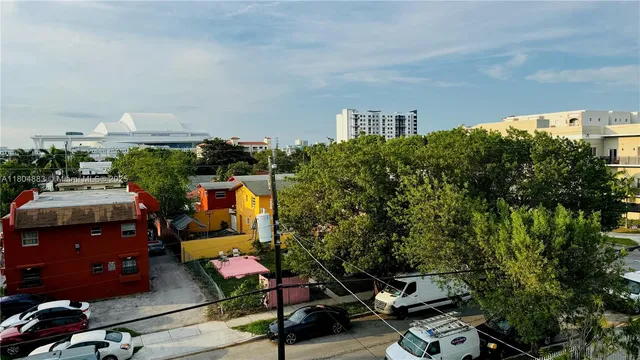 a view of a room with a large window