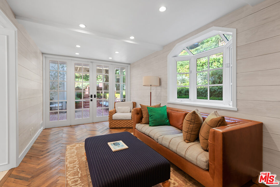 9305 Hazen Drive Beverly Hills, CA 90210 - Photo 28 of 59 a living room with furniture and a large window