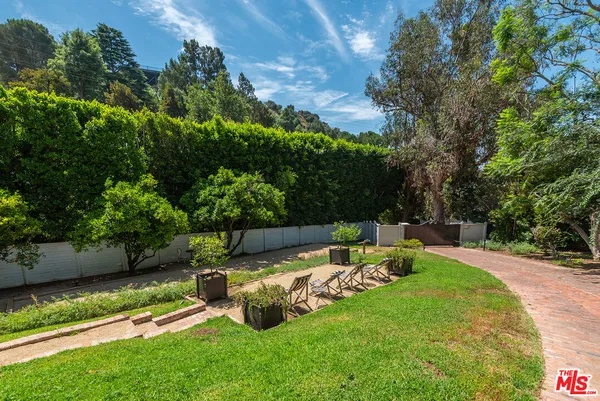 a house with yard in front of it