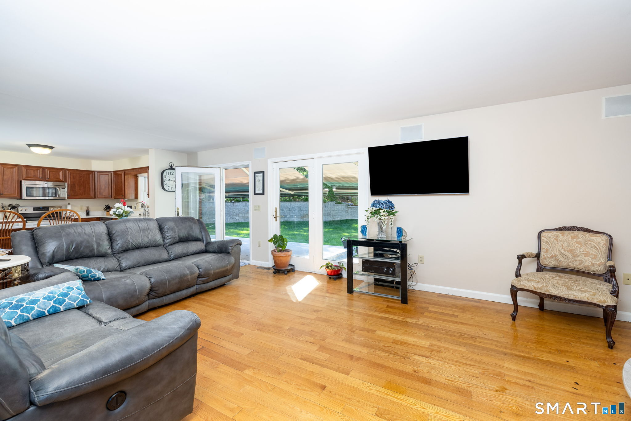 39 Chapman Road Marlborough, CT 06447 - Photo 8 of 40 a living room with furniture and a flat screen tv