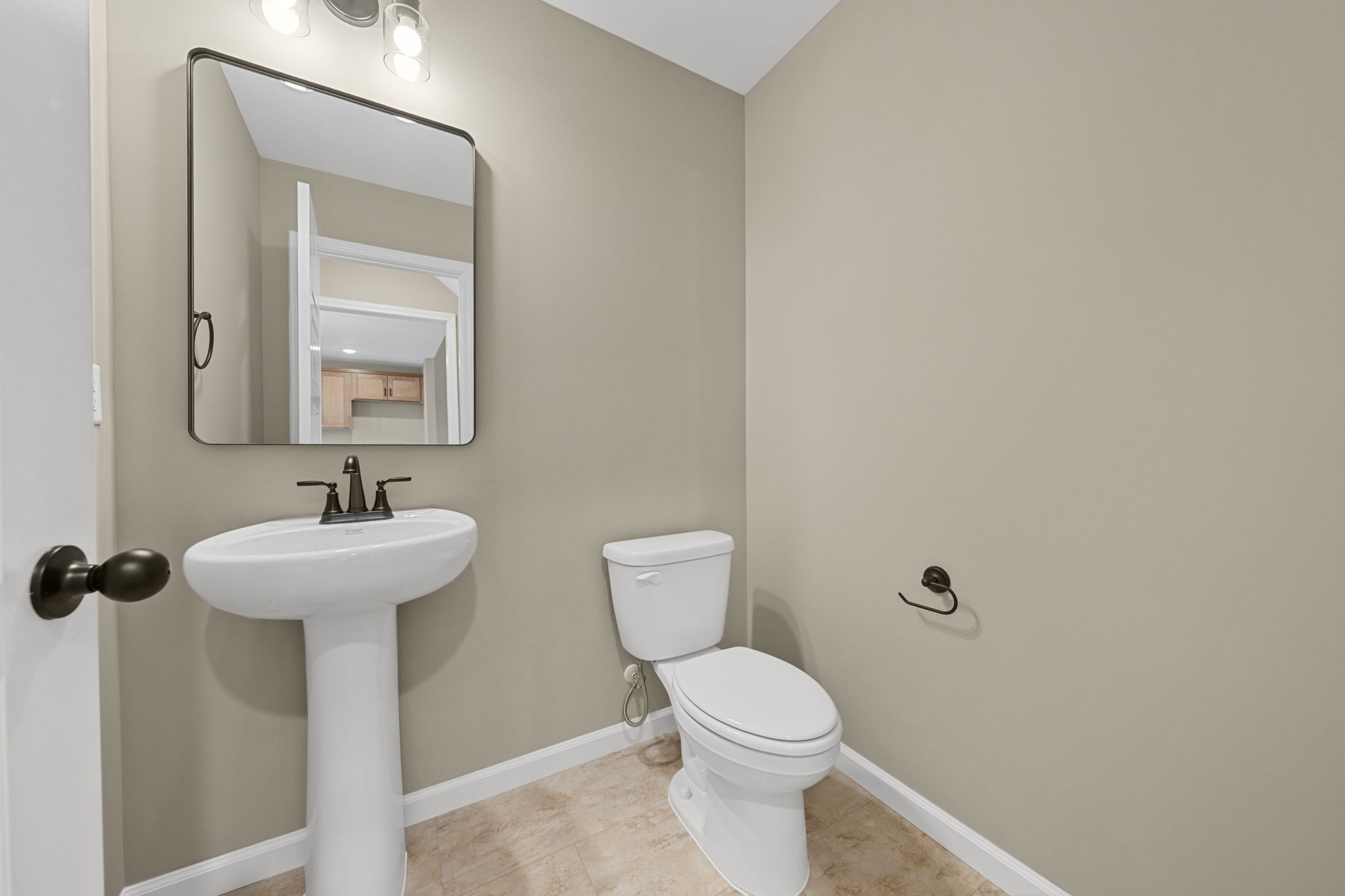 1105 Brook Court Franklin, KY 42134 - Photo 11 of 27 a bathroom with a sink a toilet and mirror