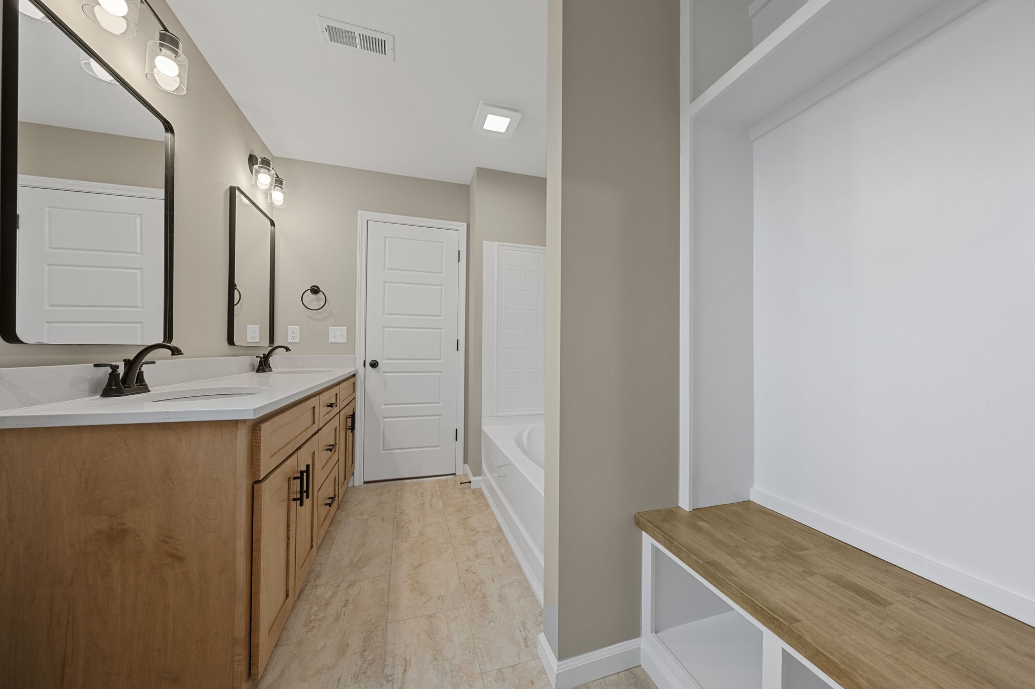 1105 Brook Court Franklin, KY 42134 - Photo 15 of 27 a bathroom with a sink a mirror and a shower