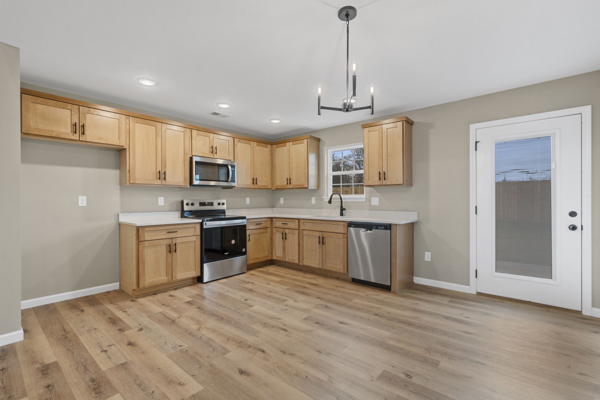 1105 Brook Court Franklin, KY 42134 - Photo 8 of 27 a kitchen with a sink window and cabinets