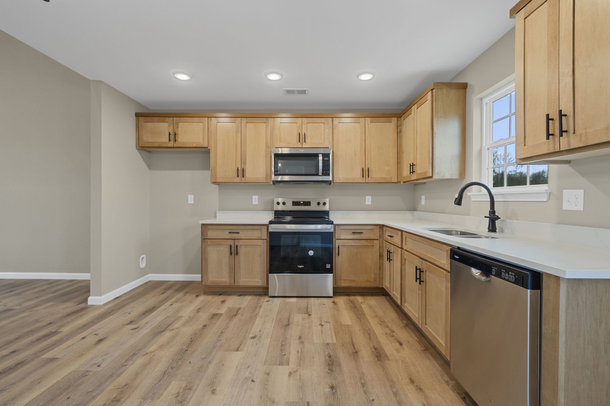 1105 Brook Court Franklin, KY 42134 - Photo 9 of 27 a kitchen with sink a microwave and cabinets