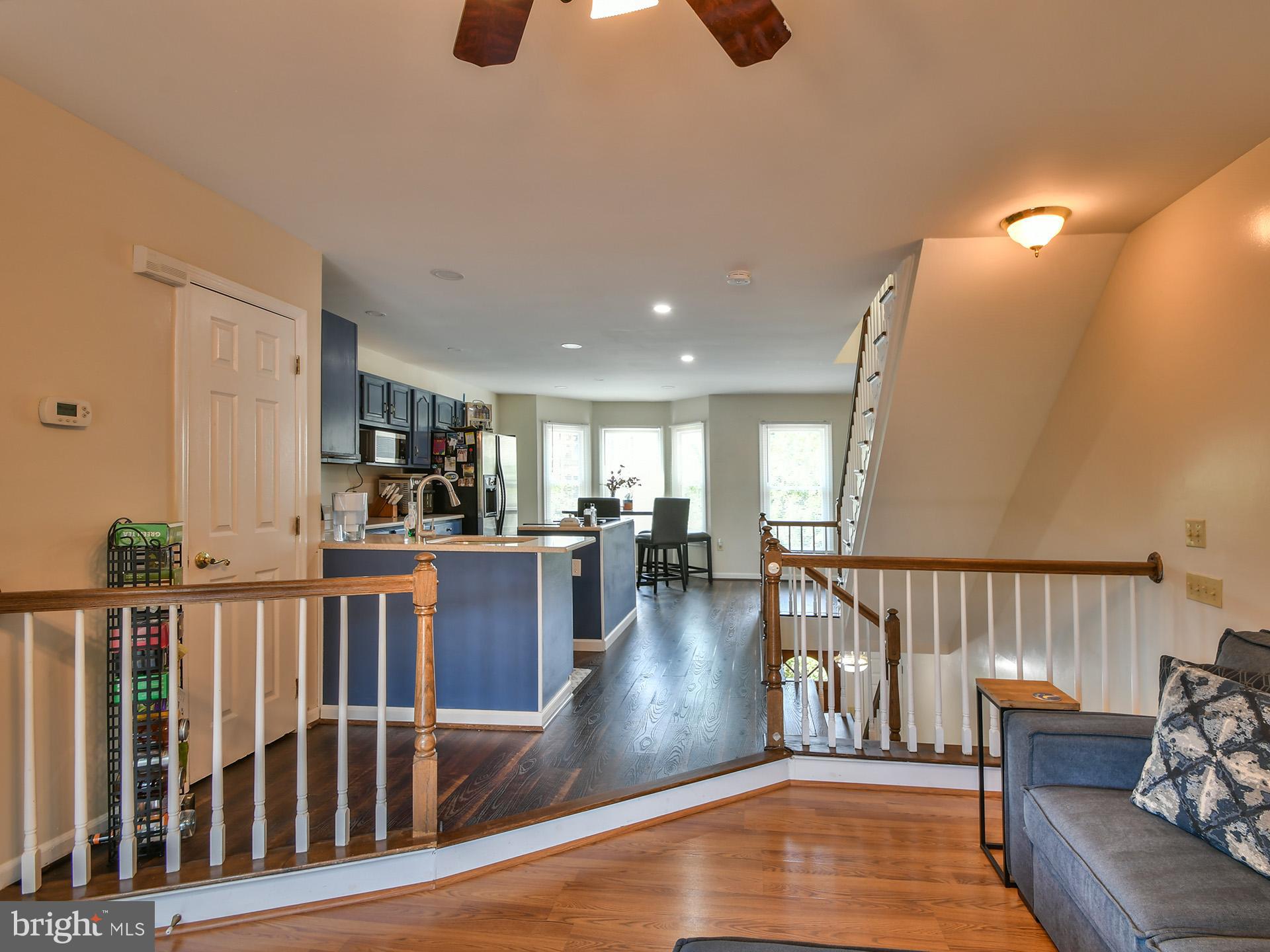 42 Victoria Square Frederick, MD 21702 - Photo 2 of 43 a view of a living room and dining room