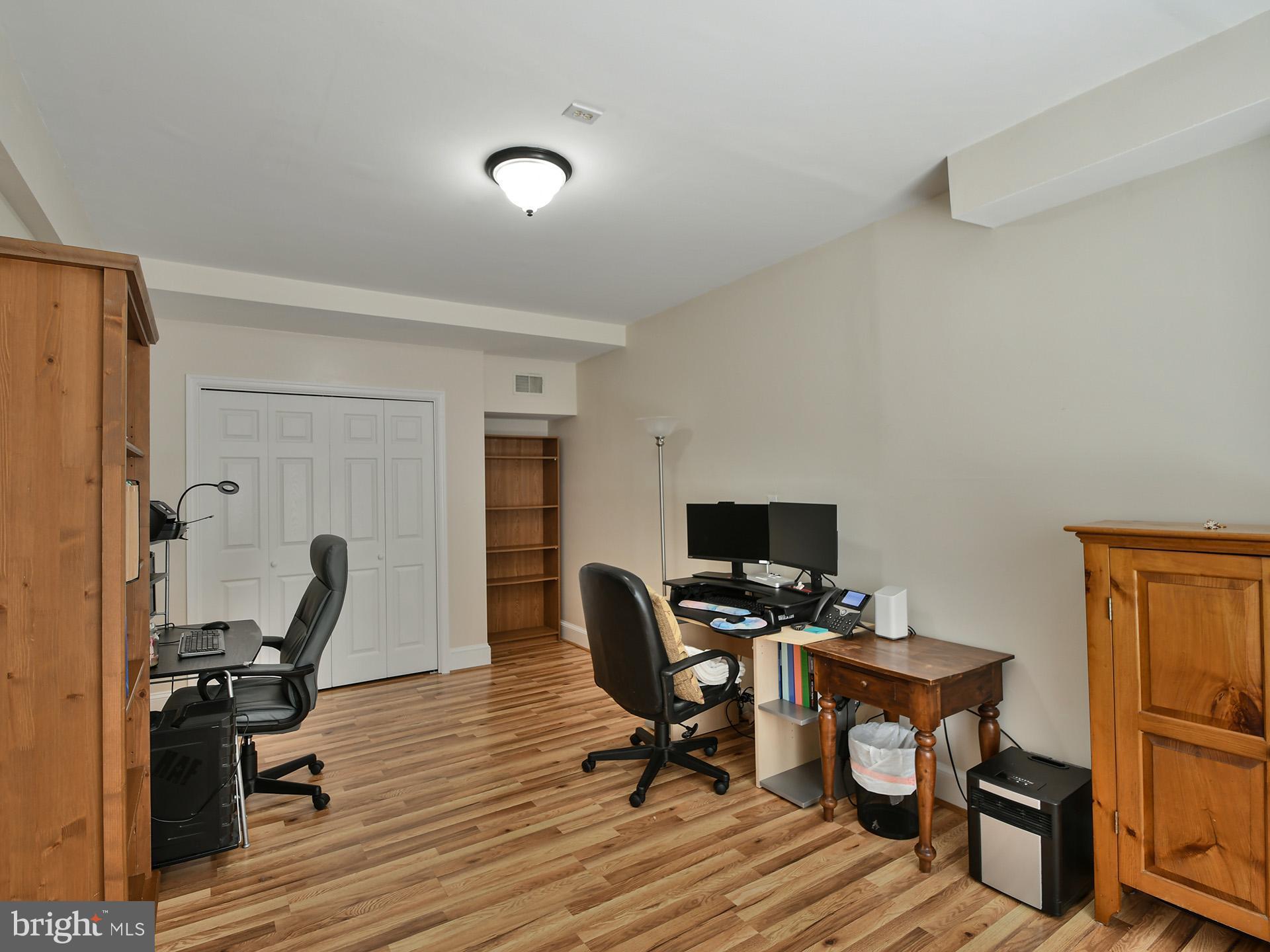 42 Victoria Square Frederick, MD 21702 - Photo 41 of 43 a view of a workspace with furniture and a window