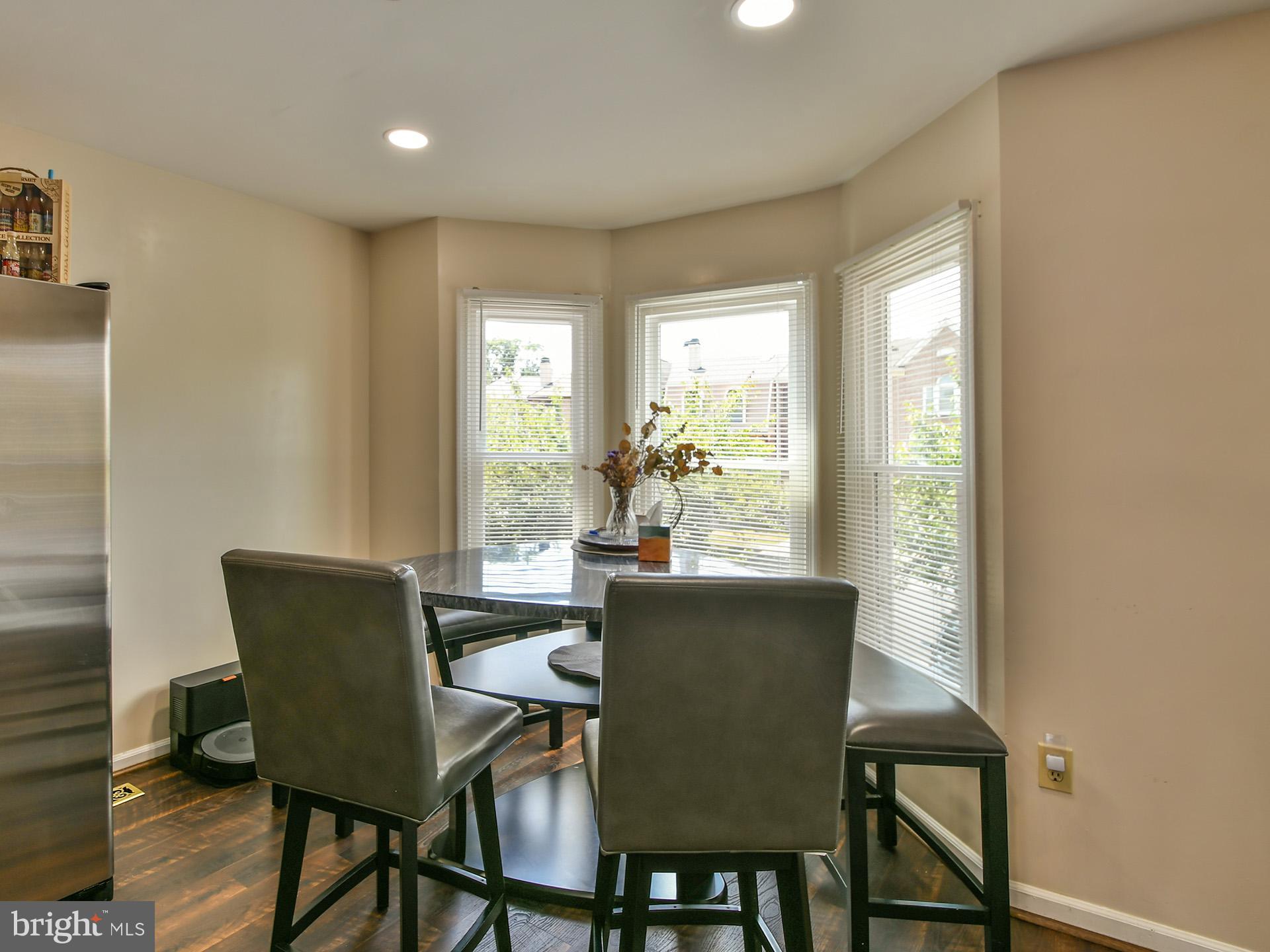 42 Victoria Square Frederick, MD 21702 - Photo 9 of 43 a view of a dining room with furniture window and outside view