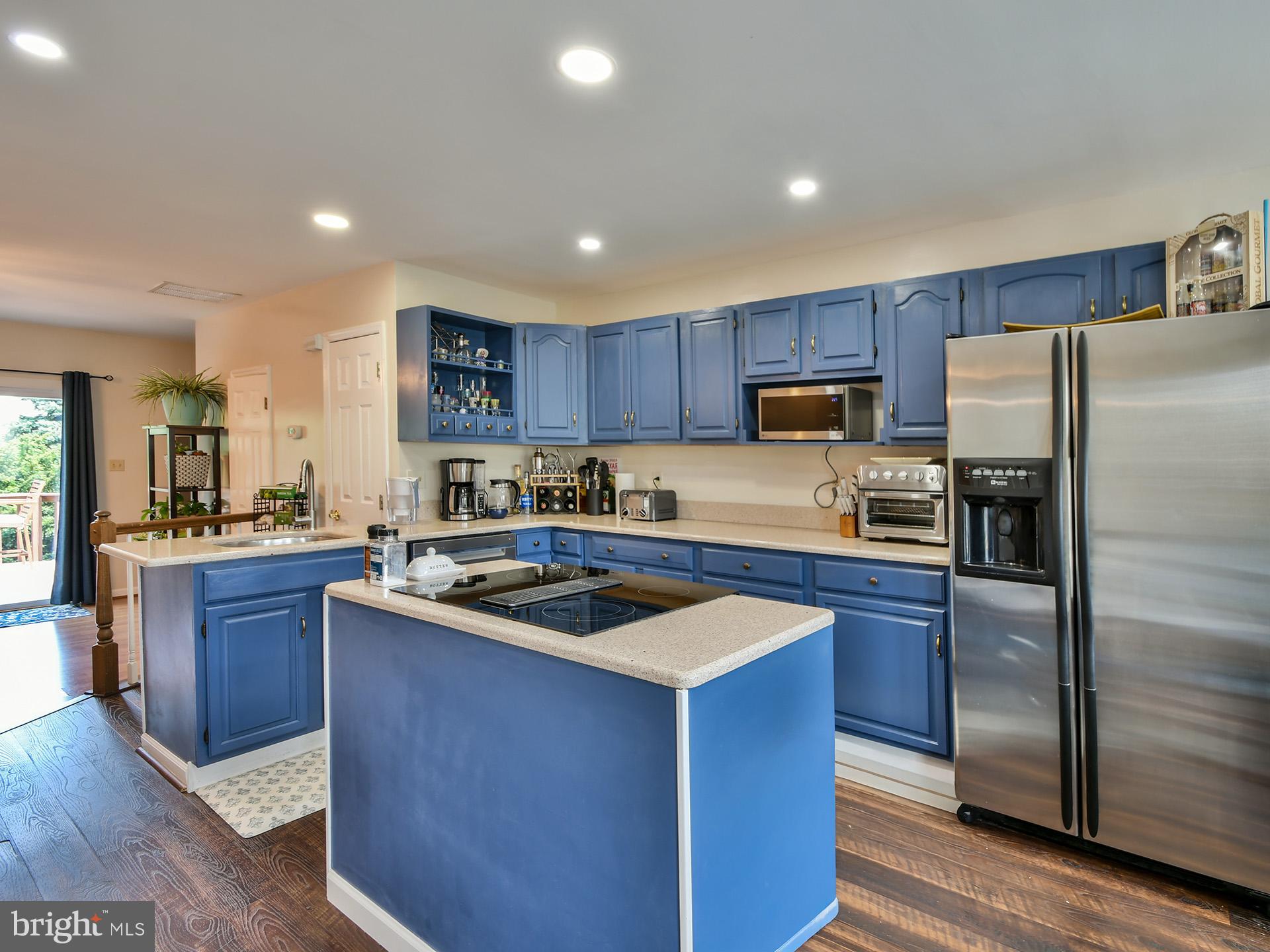 42 Victoria Square Frederick, MD 21702 - Photo 10 of 43 a kitchen with stainless steel appliances granite countertop a stove a sink dishwasher a refrigerator and a oven