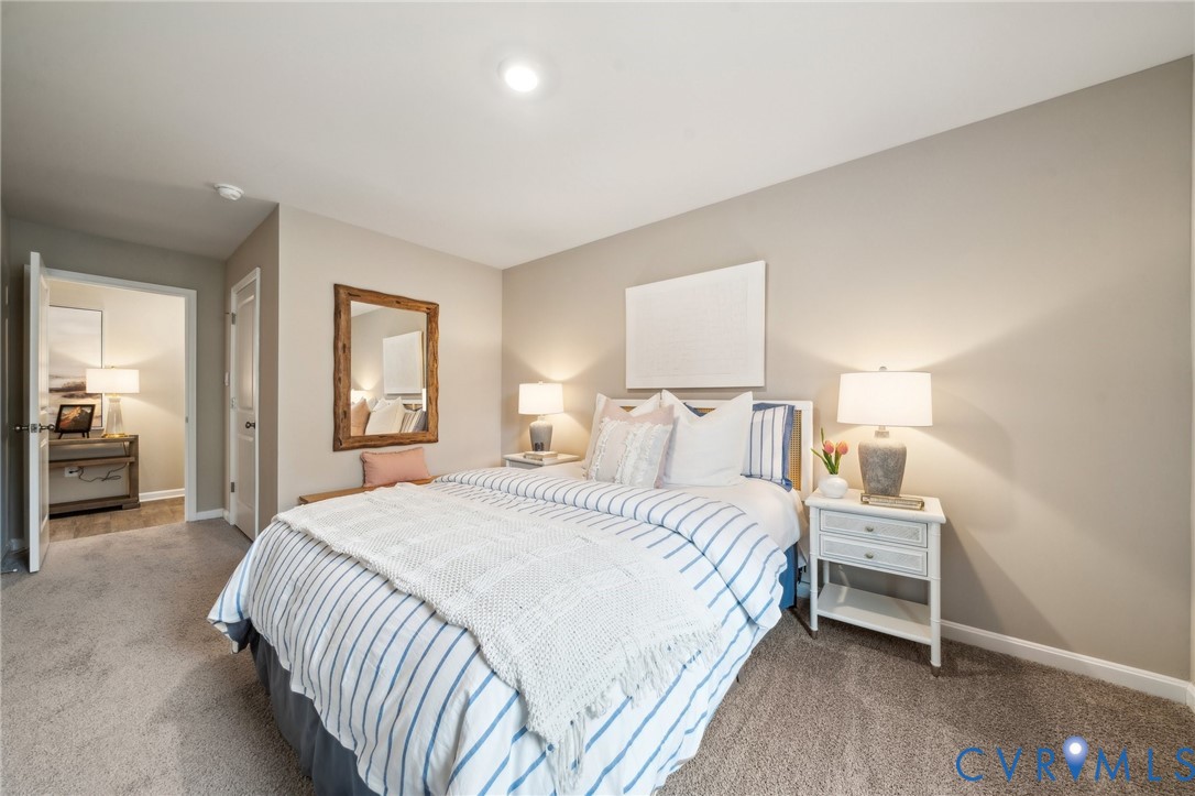 1798 River Vista Road Hopewell, VA 23860 - Photo 19 of 21 a bedroom with a bed and a view of bathroom