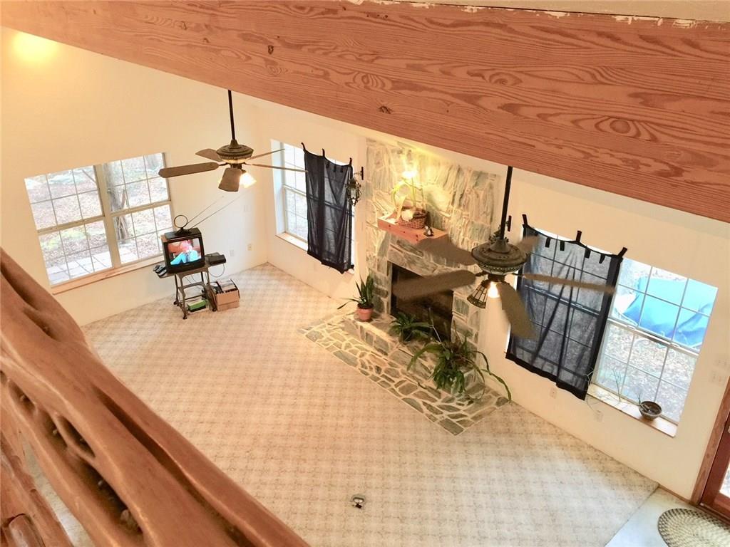 1850 North Rainbow Ranch Road Wimberley, TX 78676 - Photo 3 of 26 a living room with furniture