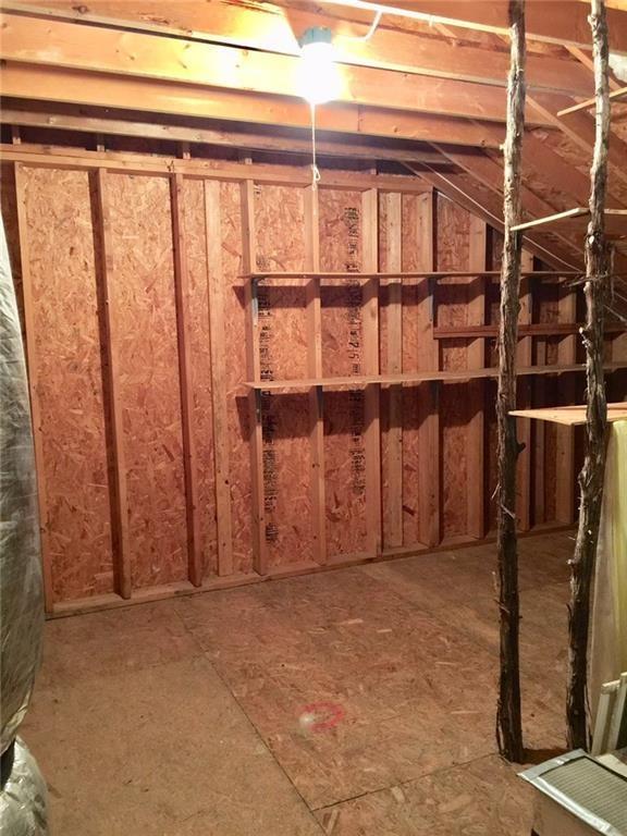 1850 North Rainbow Ranch Road Wimberley, TX 78676 - Photo 9 of 26 a view of a room with wooden walls