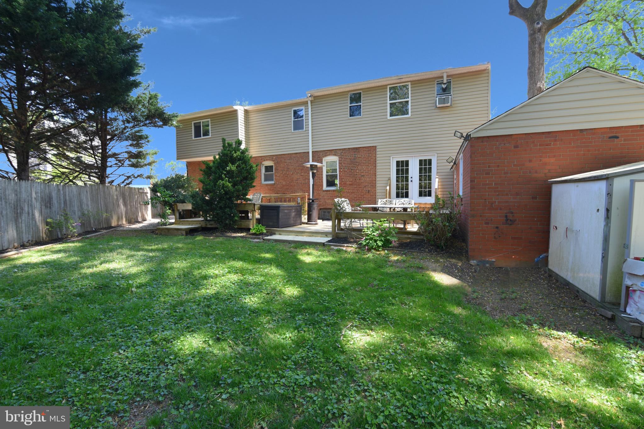 210 Northmoor Drive Silver Spring, MD 20901 - Photo 37 of 43 a view of a house with backyard and sitting area