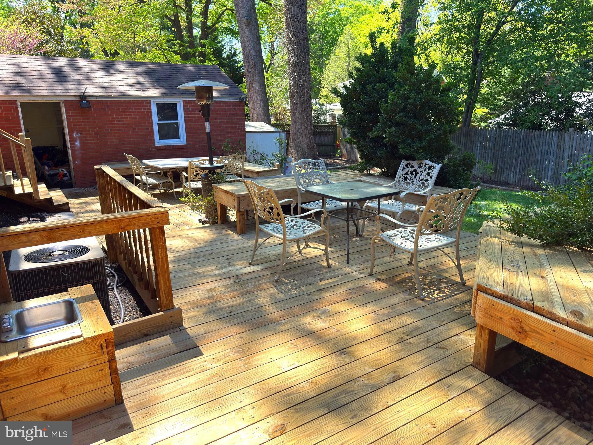 210 Northmoor Drive Silver Spring, MD 20901 - Photo 38 of 43 a view of backyard with seating area and trees