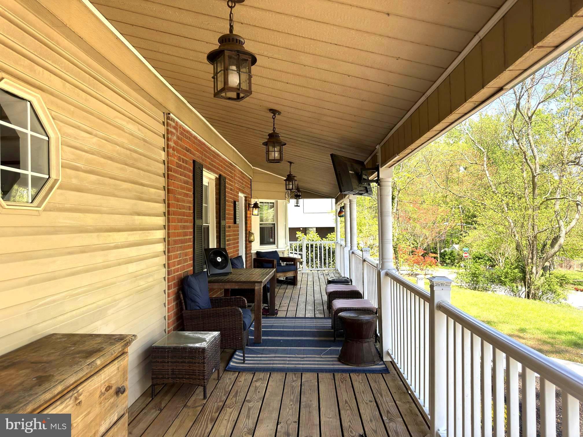 210 Northmoor Drive Silver Spring, MD 20901 - Photo 40 of 43 a view of a porch with wooden floor