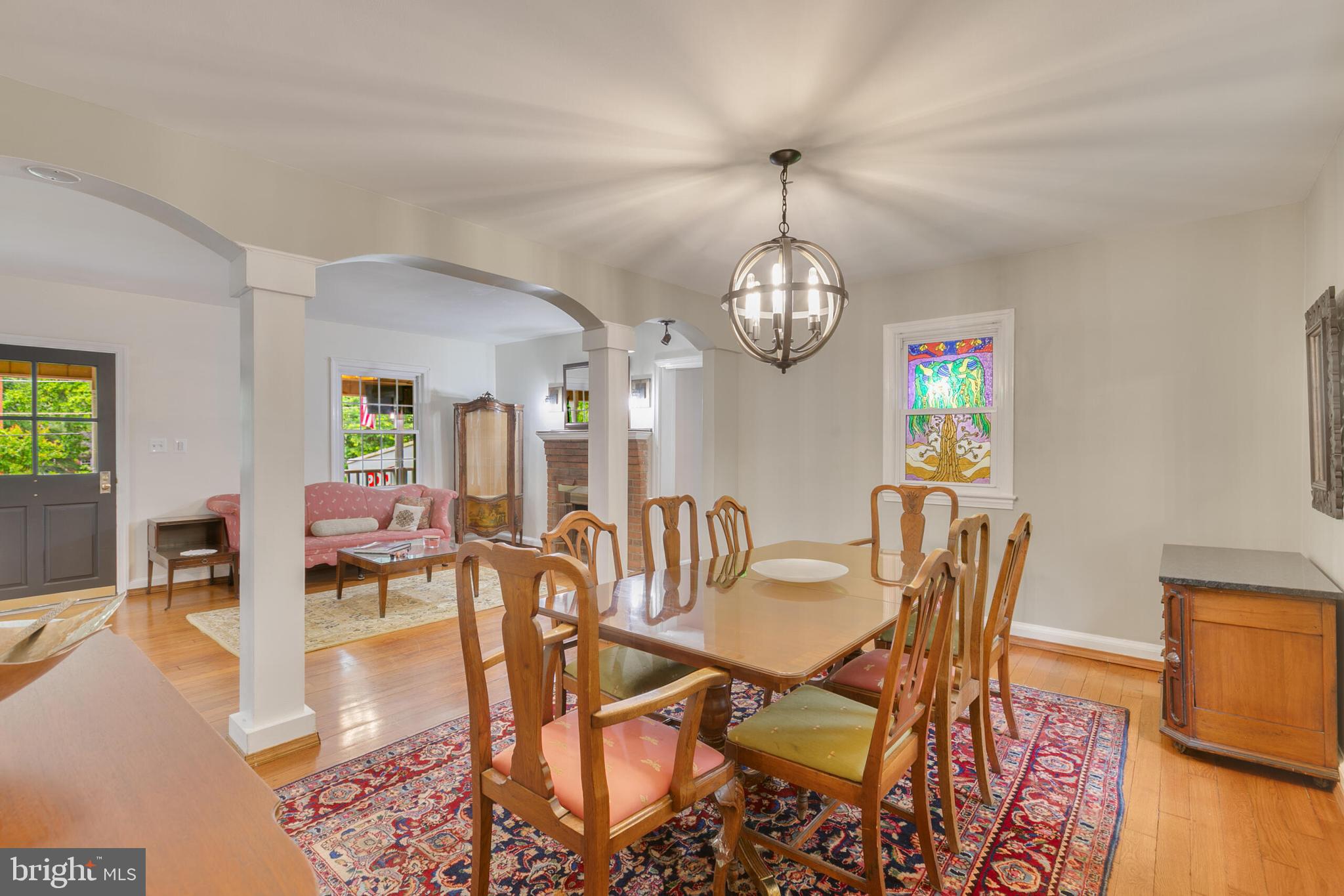 210 Northmoor Drive Silver Spring, MD 20901 - Photo 4 of 43 a view of a dining room with furniture a chandelier and wooden floor