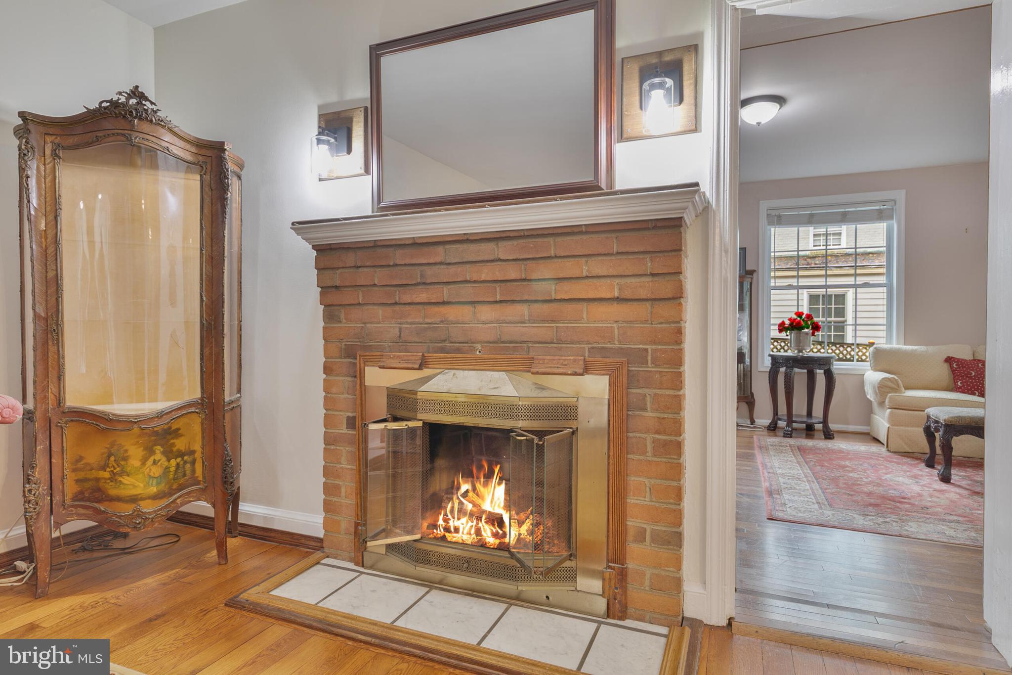 210 Northmoor Drive Silver Spring, MD 20901 - Photo 6 of 43 a living room with furniture and a fireplace