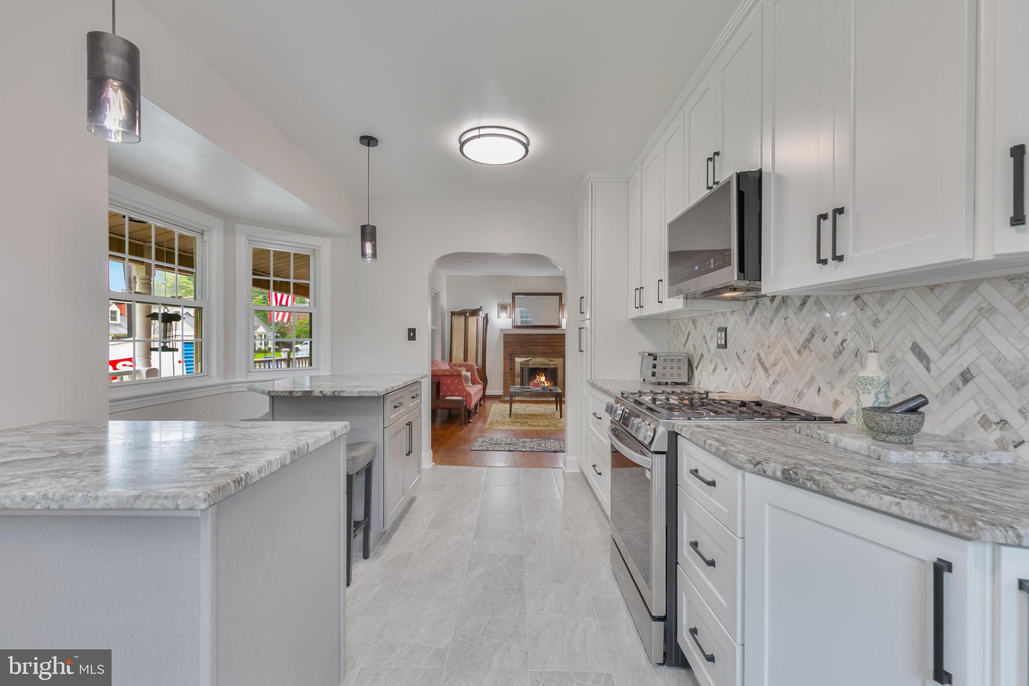 210 Northmoor Drive Silver Spring, MD 20901 - Photo 10 of 43 a kitchen with stainless steel appliances granite countertop a sink stove and cabinets