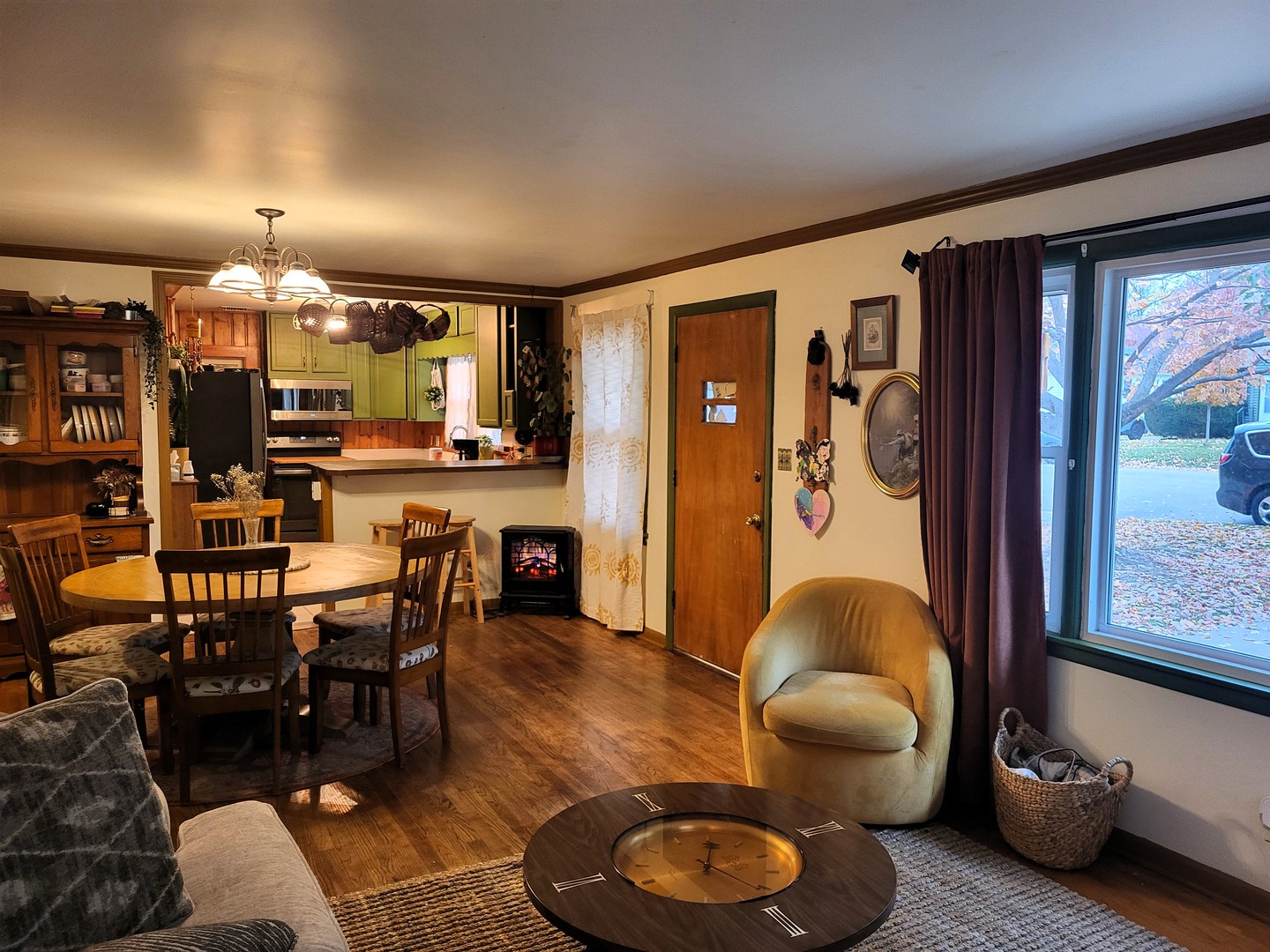 914 Cooper Street Dixon, IL 61021 - Photo 3 of 10 a living room with furniture and a large window