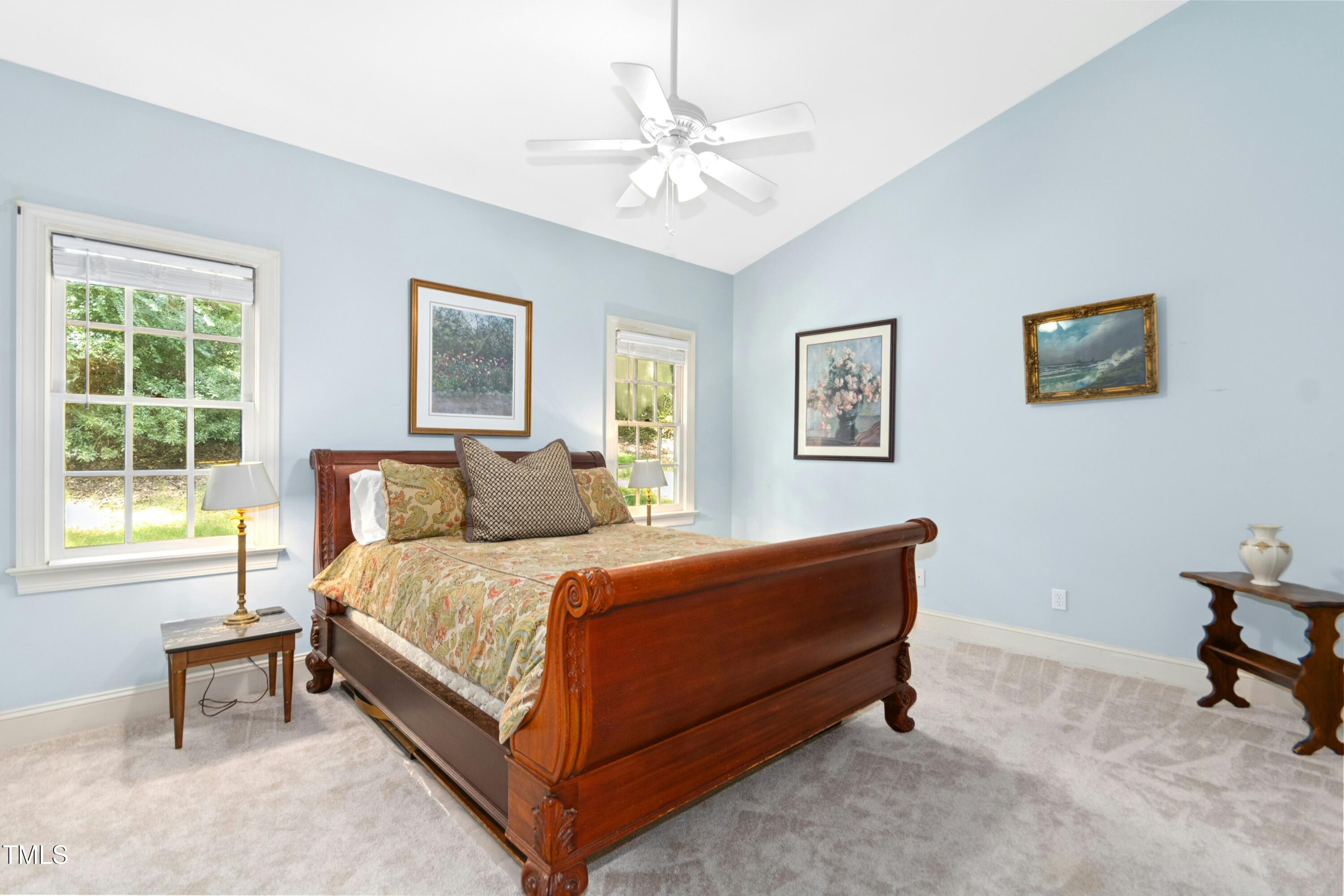 12317 Lockhart Lane Raleigh, NC 27614 - Photo 20 of 38 a bed room with a bed and a chair