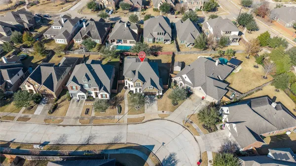 a view of multiple houses with outdoor space