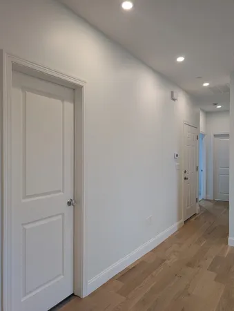 a view of hallway with closet